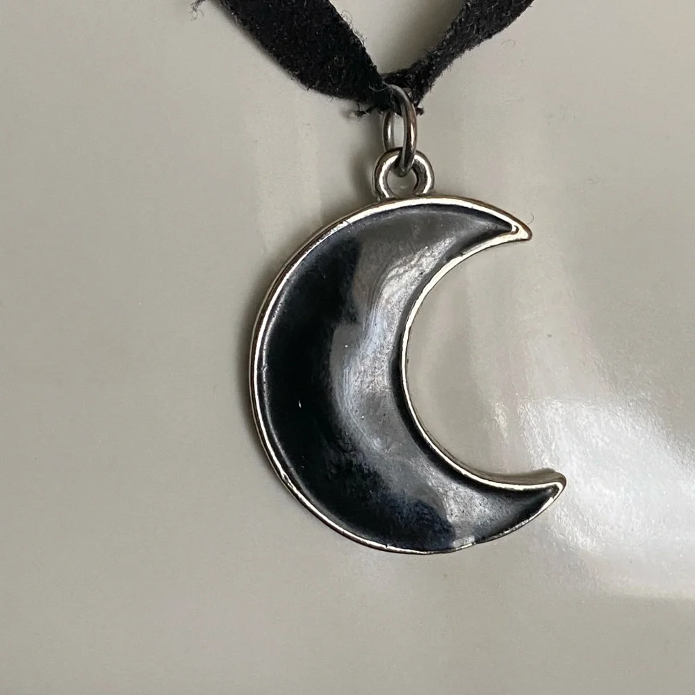 Hot Topic black crescent moon enamel charm necklace